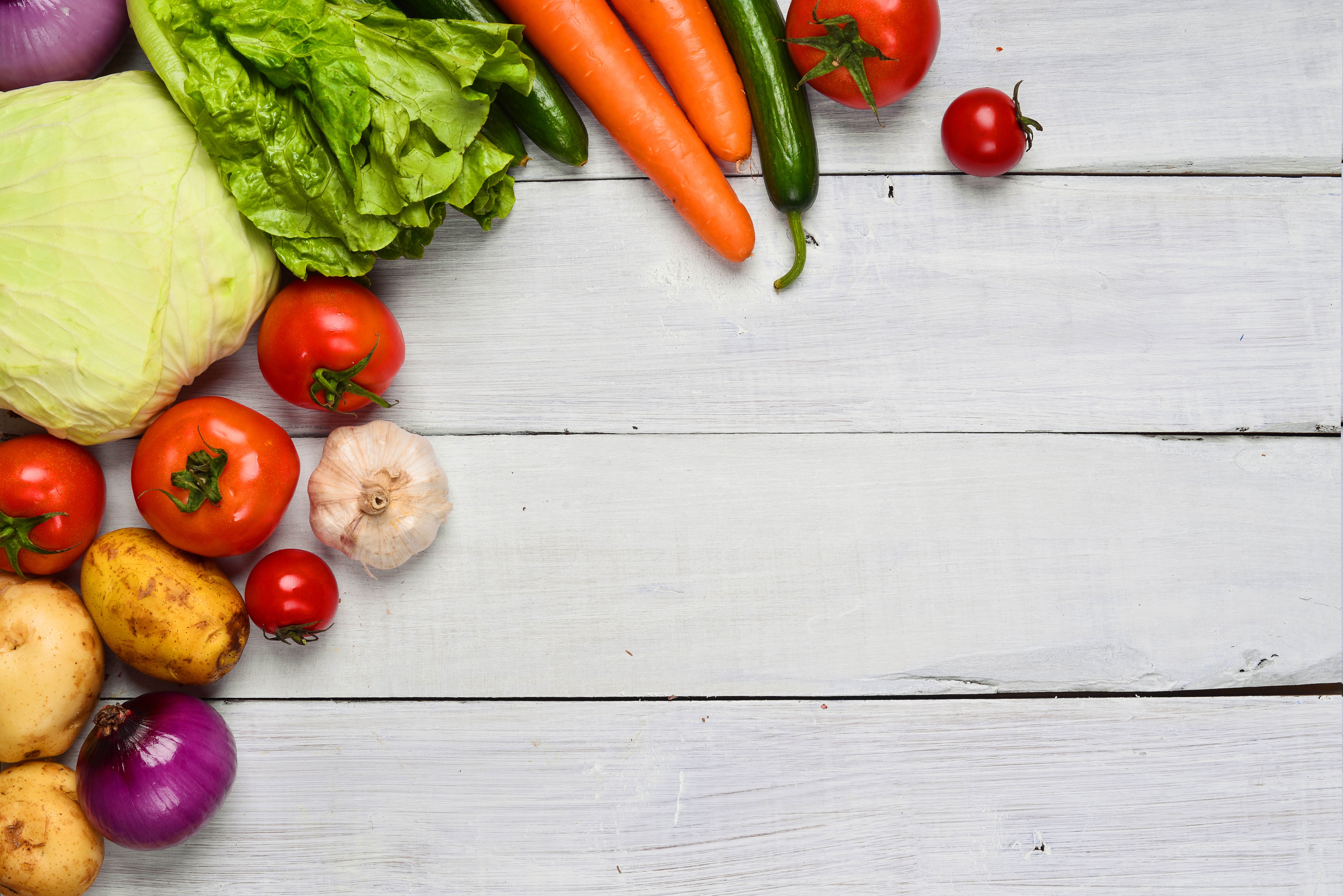 studio photography of different fruits and vegetables on old wooden